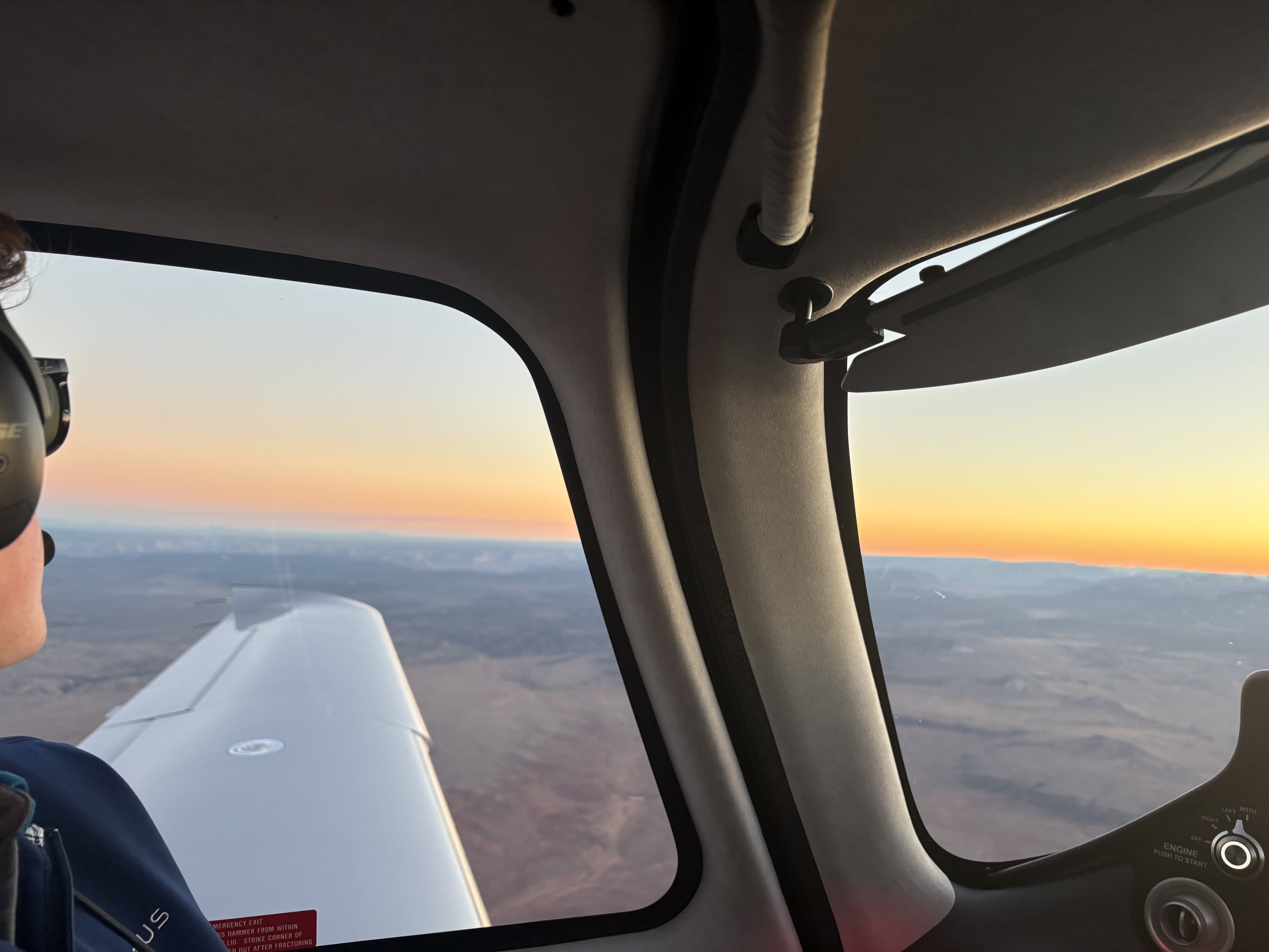 View from Cirrus cabin at sunset on a long cross-country