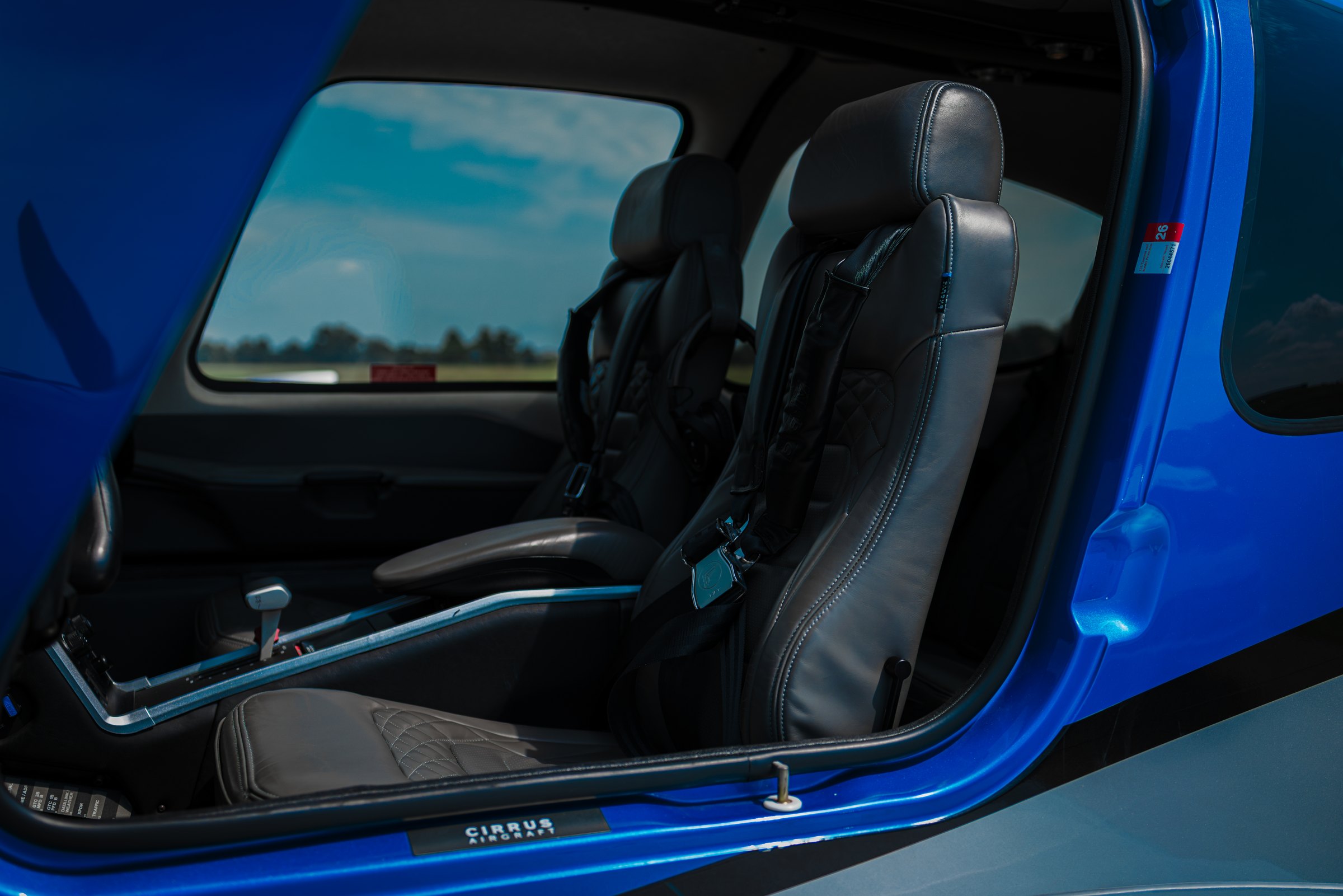 The leather cockpit of a Cirrus SR