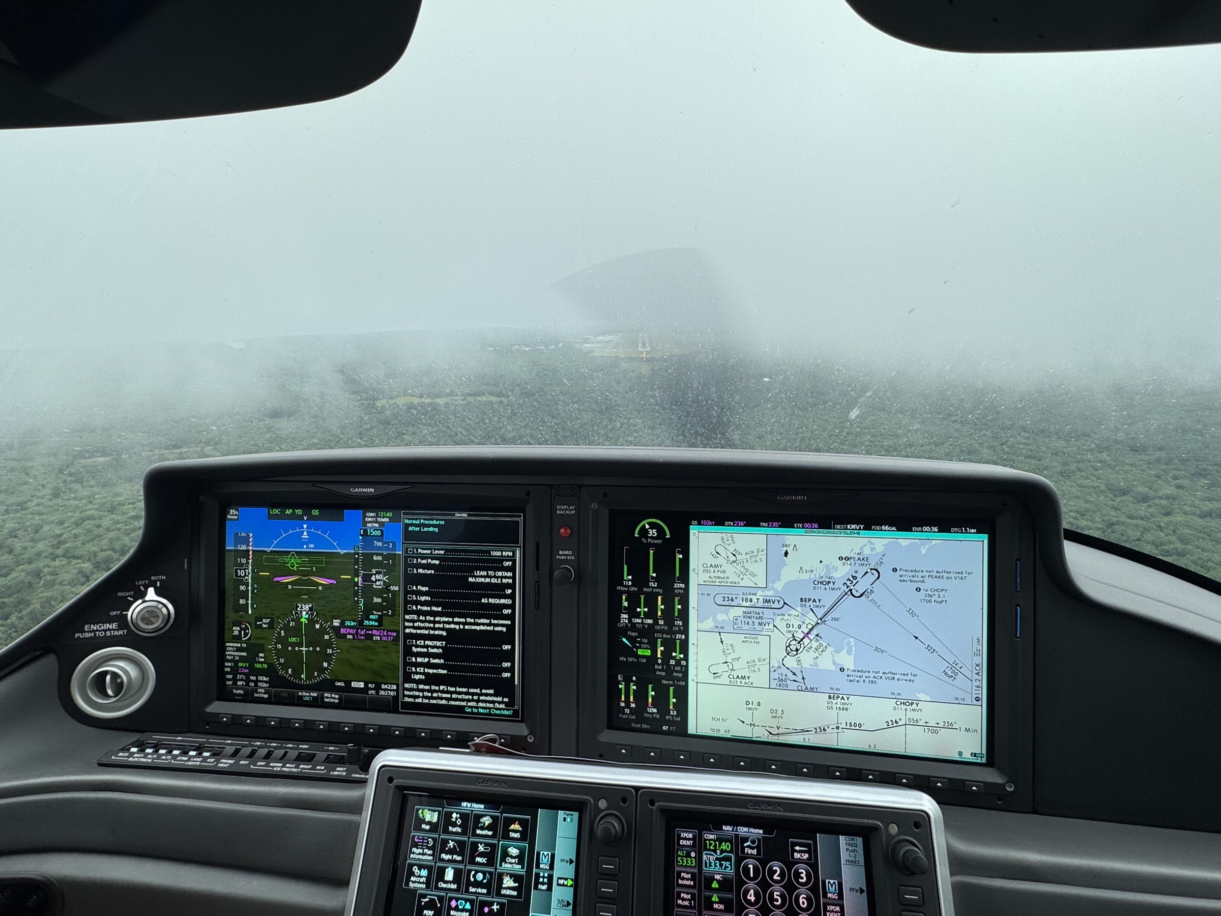 Cirrus cockpit with clouds through the windshield